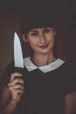 woman-smiling-with-knife.jpg